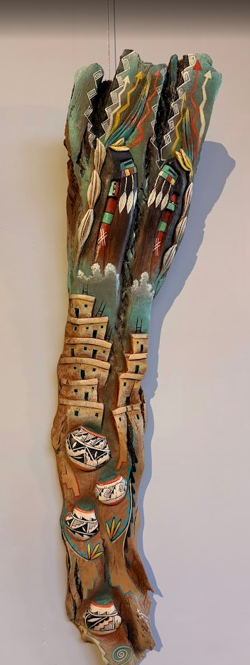 Longhair Pueblo, a carved wood piece by Jake Warner